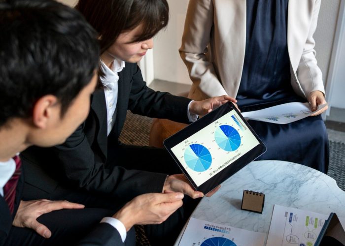 Employees Discussing About The Data | Condor PH