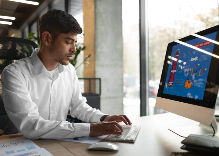 A Man Typing On His Computer Keyboard | Condor PH