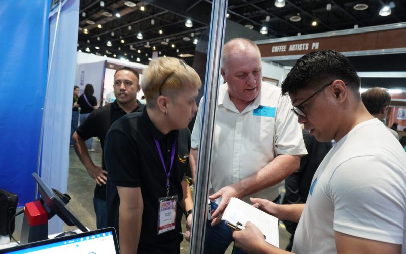 Dave Appleton assisting the clients who's inquiring POS system