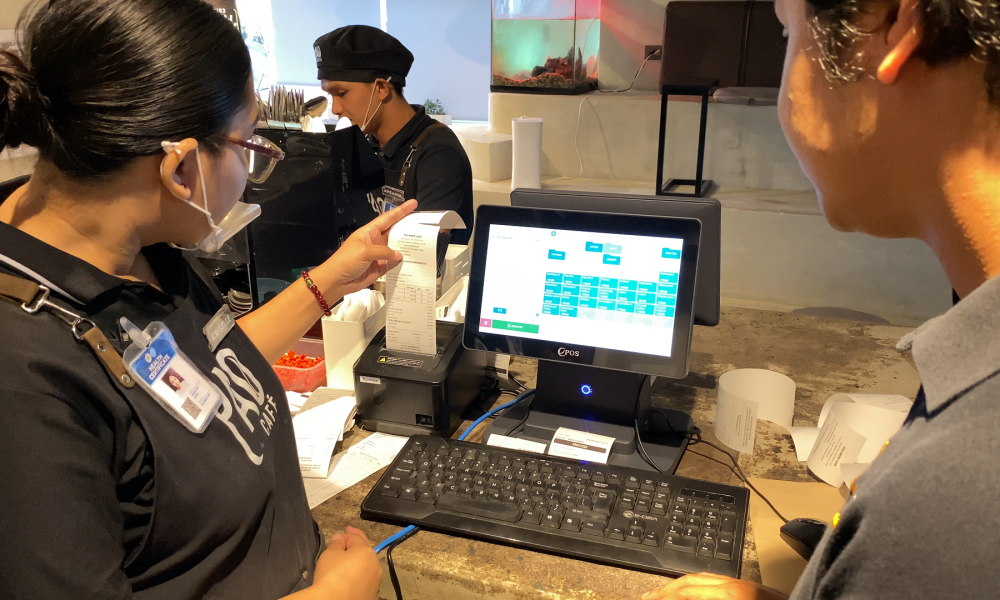 The Condor Support Team Is Demonstrating A New POS System To Client | Condor PH
