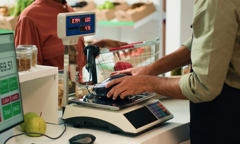 A Person Weighing A Piece Of Food | Condor PH A Person Weighing A Piece Of Food | Condor PH