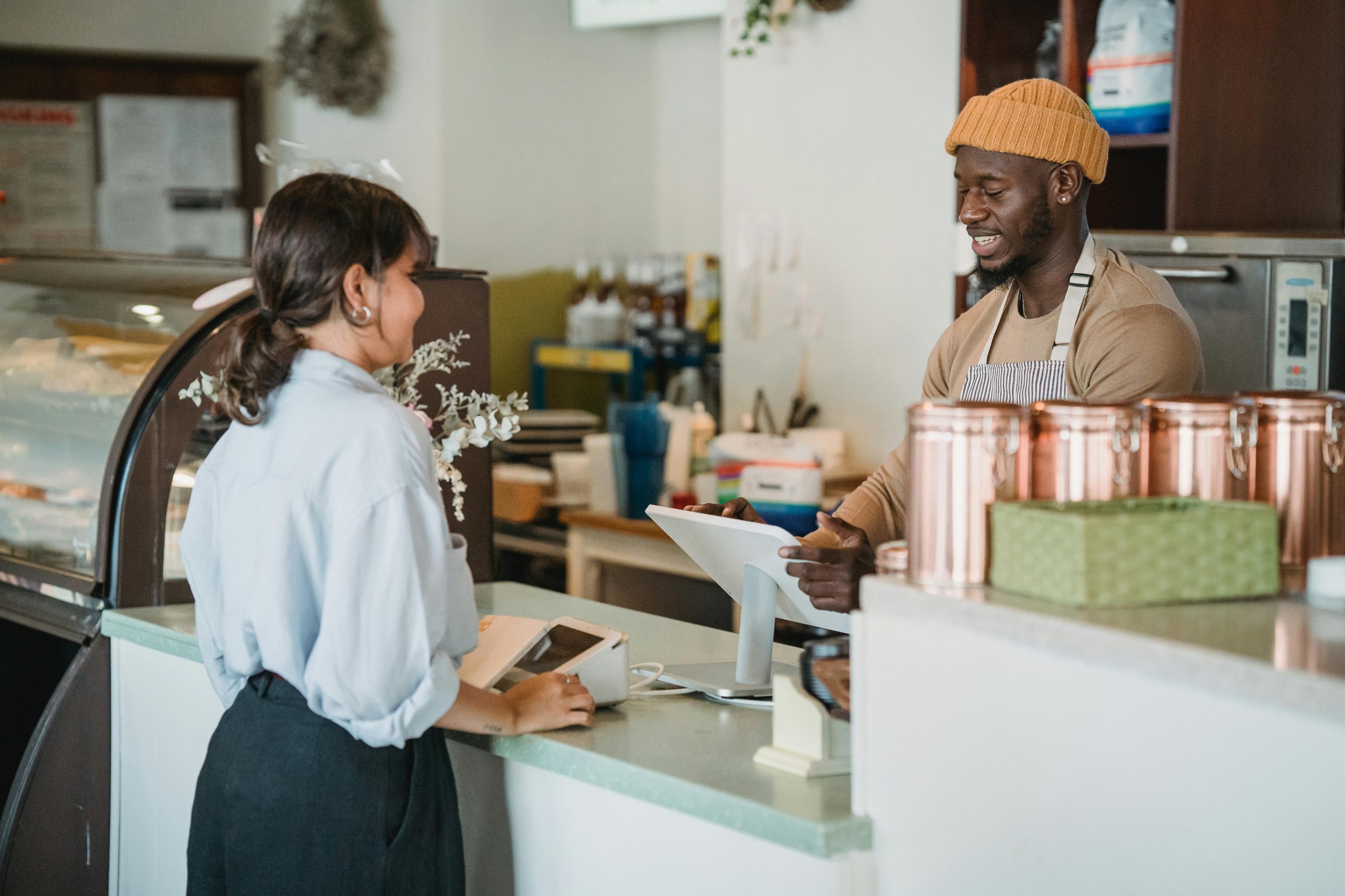 A woman ordering coffee in cafe